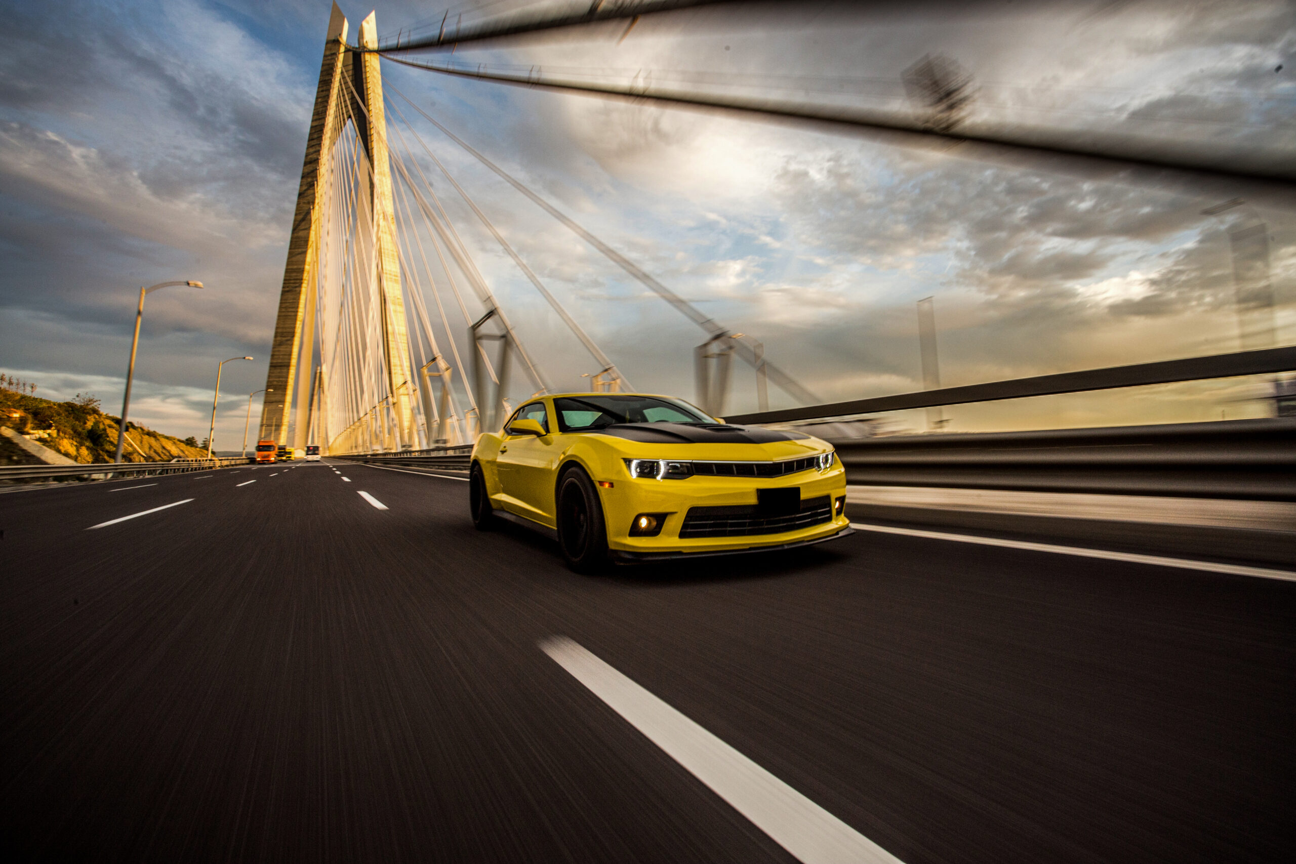 yellow-sport-car-with-black-autotuning-bridge